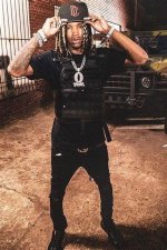 King Von with Guns: the Life and Legacy of a Rising Star